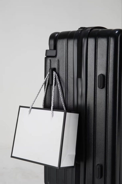 Black travel suitcase with side hook