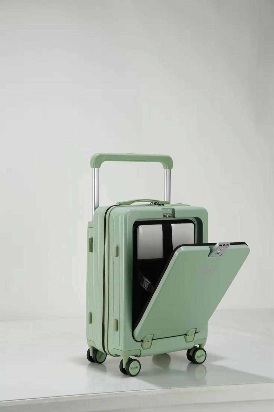 Green travel suitcase with laptop compartment