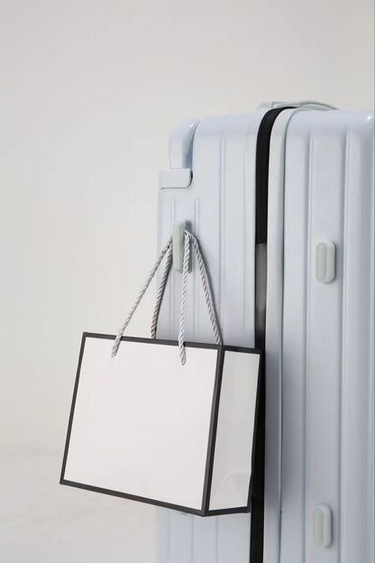 Blue travel suitcase with side hook