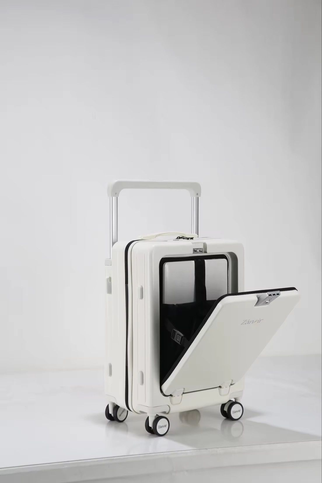 White travel suitcase with laptop compartment
